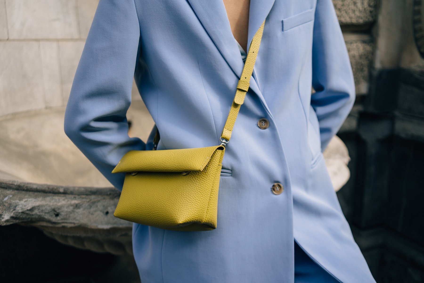 Person in Blue Blazer and Yellow Sling Bag